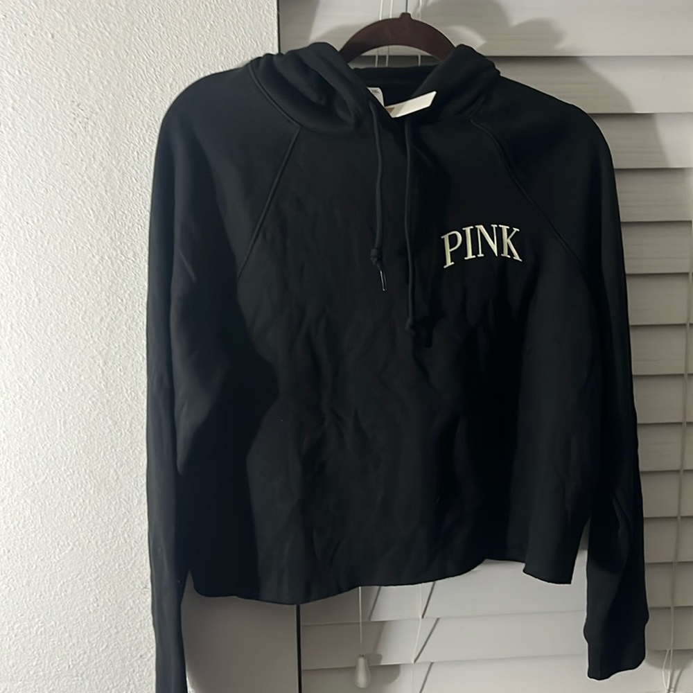 - New PINK cropped hoodie. Black. Size medium. Never worn.